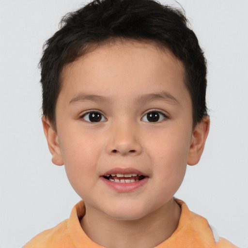 Joyful white child male with short  brown hair and brown eyes