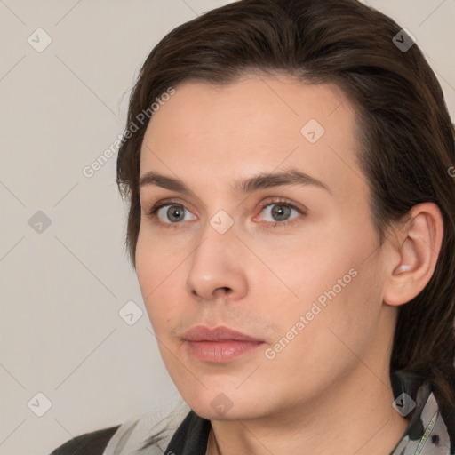 Neutral white young-adult female with medium  brown hair and brown eyes