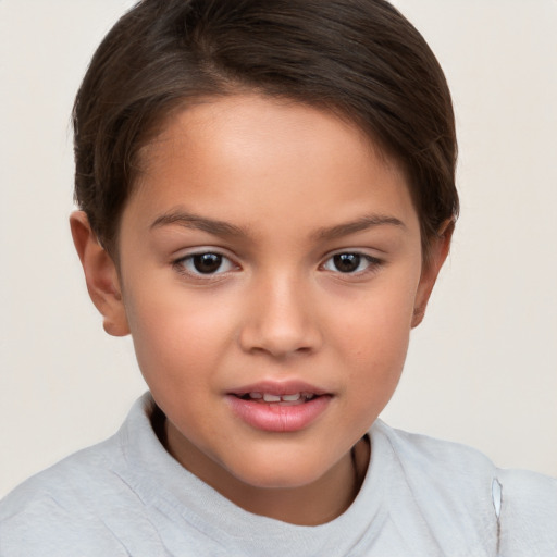 Joyful white child female with short  brown hair and brown eyes