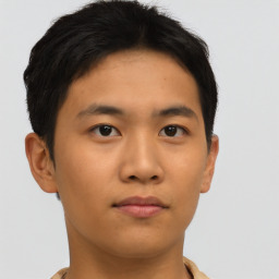 Neutral asian young-adult male with short  brown hair and brown eyes