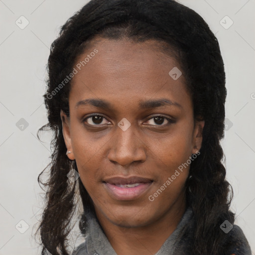 Joyful black young-adult female with long  black hair and brown eyes