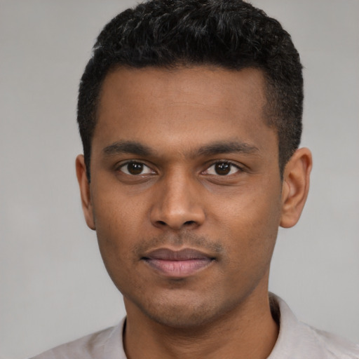 Neutral latino young-adult male with short  black hair and brown eyes