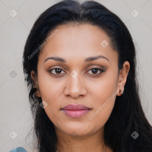 Joyful latino young-adult female with long  black hair and brown eyes