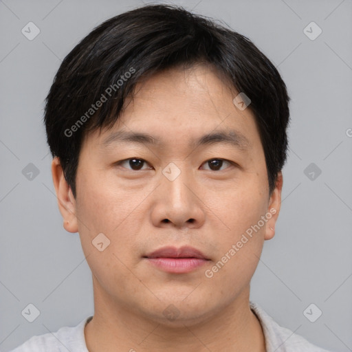 Neutral asian young-adult male with short  black hair and brown eyes