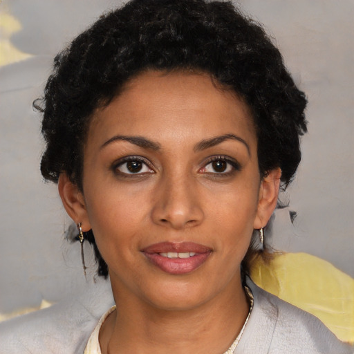 Joyful latino young-adult female with short  brown hair and brown eyes