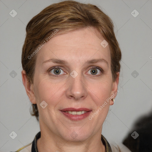 Joyful white adult female with medium  brown hair and grey eyes