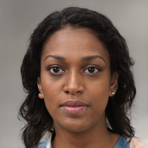 Neutral black young-adult female with medium  black hair and brown eyes