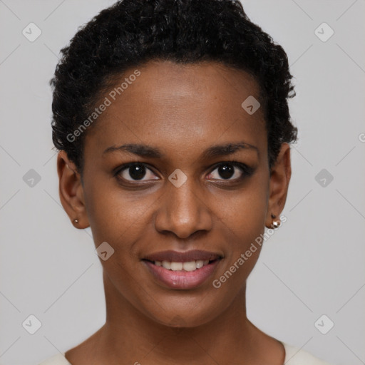 Joyful black young-adult female with short  black hair and brown eyes