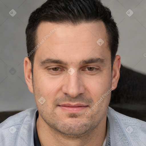 Joyful white adult male with short  brown hair and brown eyes