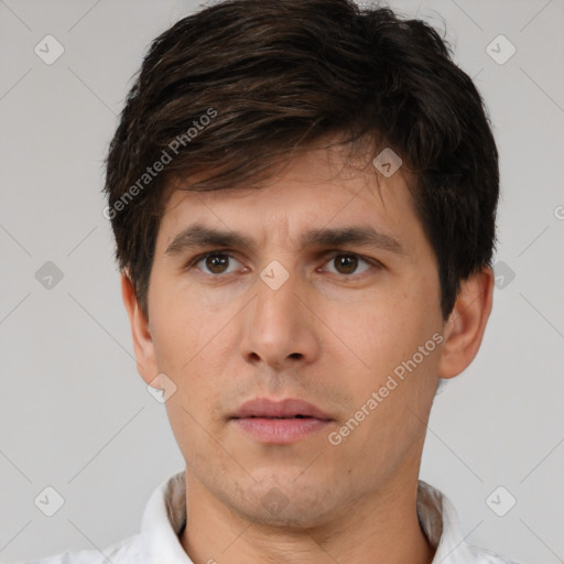 Neutral white young-adult male with short  brown hair and brown eyes