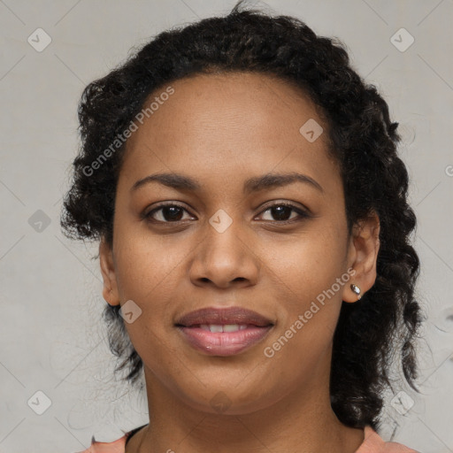 Joyful black young-adult female with medium  brown hair and brown eyes