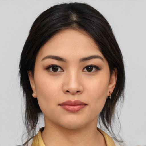 Neutral asian young-adult female with medium  black hair and brown eyes