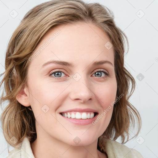 Joyful white young-adult female with medium  brown hair and blue eyes