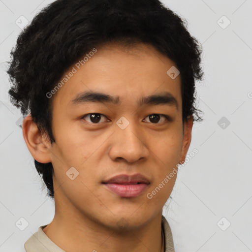 Joyful latino young-adult male with short  brown hair and brown eyes