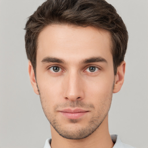 Neutral white young-adult male with short  brown hair and brown eyes