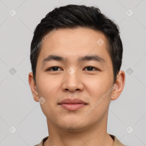 Joyful latino young-adult male with short  brown hair and brown eyes