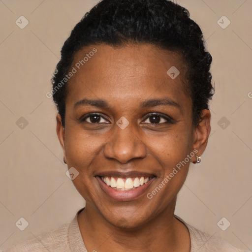 Joyful black young-adult female with short  black hair and brown eyes