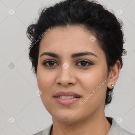 Joyful latino young-adult female with short  black hair and brown eyes