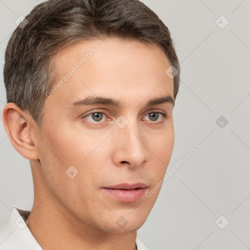 Neutral white young-adult male with short  brown hair and brown eyes