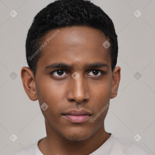 Neutral latino young-adult male with short  black hair and brown eyes