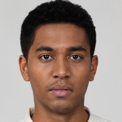 Neutral latino young-adult male with short  brown hair and brown eyes