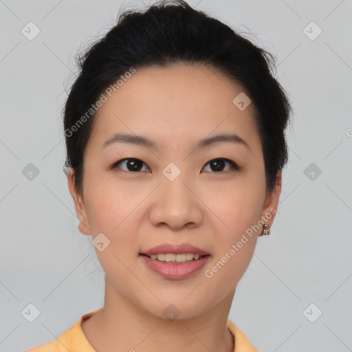 Joyful asian young-adult female with short  brown hair and brown eyes