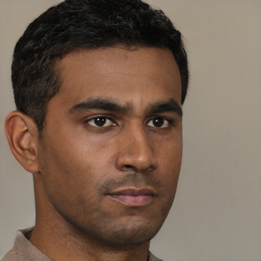 Neutral black young-adult male with short  brown hair and brown eyes