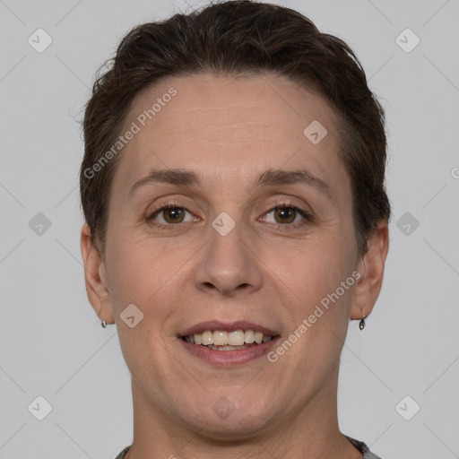 Joyful white adult female with short  brown hair and brown eyes