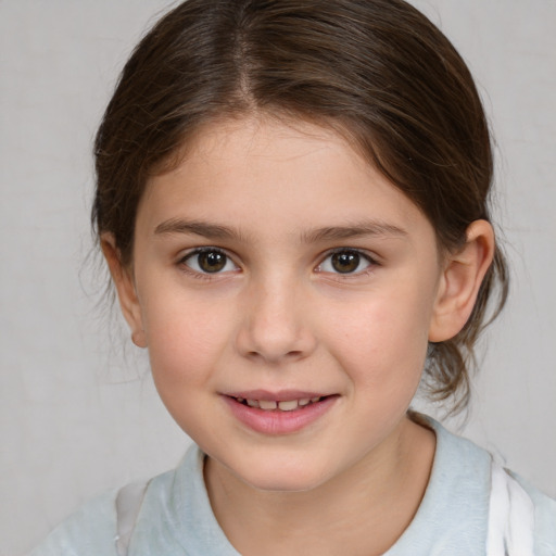 Joyful white child female with medium  brown hair and brown eyes