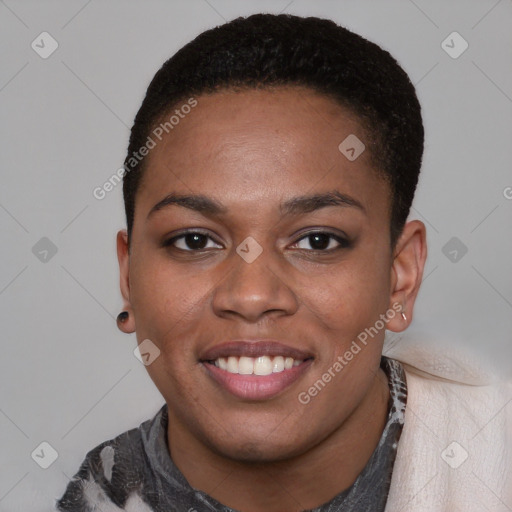 Joyful black young-adult female with short  brown hair and brown eyes