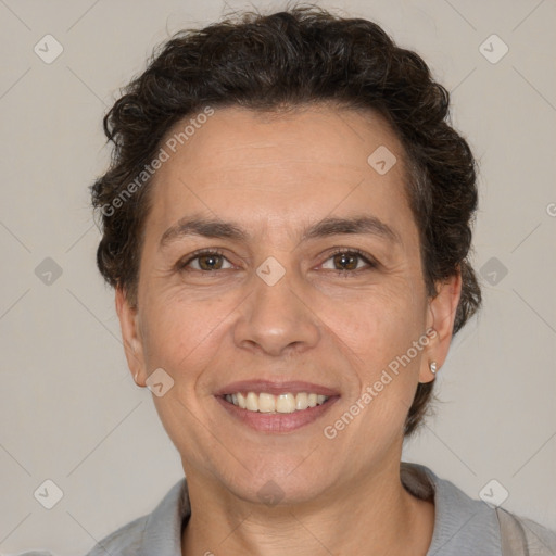 Joyful white adult female with short  brown hair and brown eyes