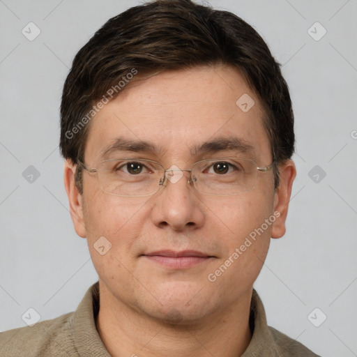 Joyful white adult male with short  brown hair and brown eyes