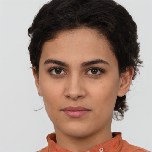 Neutral white young-adult female with short  brown hair and brown eyes