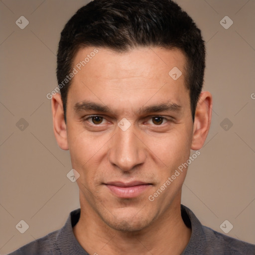 Joyful white adult male with short  black hair and brown eyes