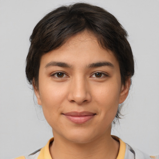 Joyful white young-adult female with medium  brown hair and brown eyes