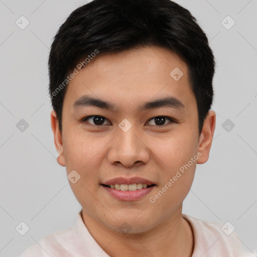 Joyful asian young-adult male with short  brown hair and brown eyes