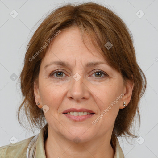 Joyful white adult female with medium  brown hair and brown eyes