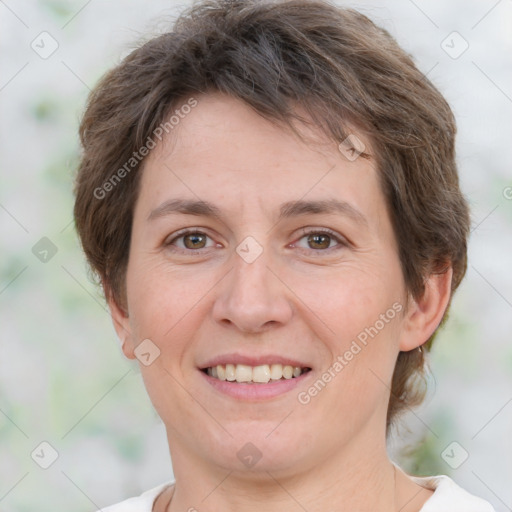 Joyful white adult female with short  brown hair and brown eyes