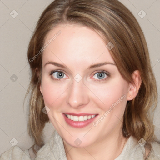 Joyful white young-adult female with medium  brown hair and blue eyes