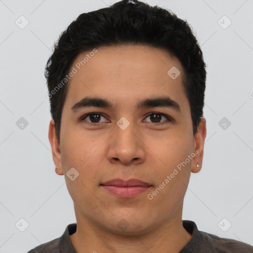 Joyful latino young-adult male with short  black hair and brown eyes