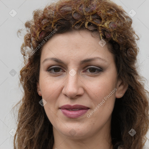 Joyful white adult female with long  brown hair and brown eyes