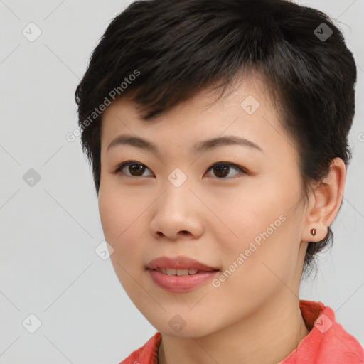 Joyful asian young-adult female with short  brown hair and brown eyes