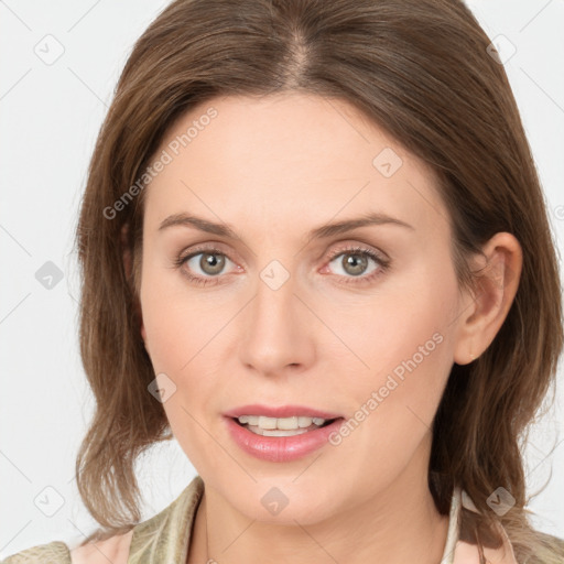 Joyful white young-adult female with medium  brown hair and green eyes