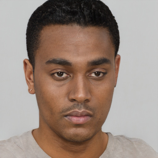 Neutral black young-adult male with short  black hair and brown eyes