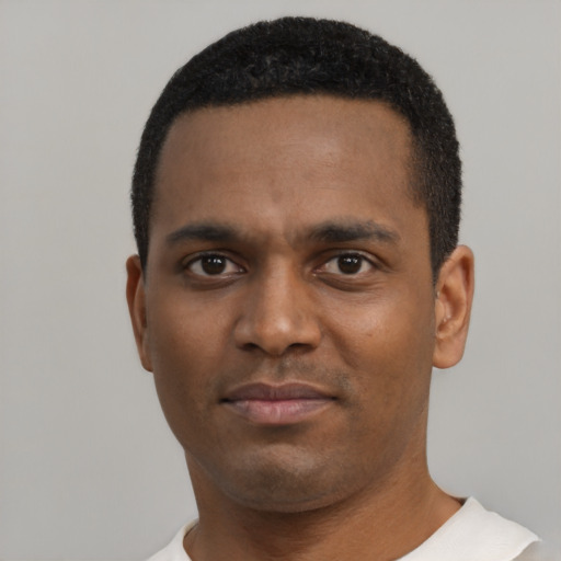 Neutral black young-adult male with short  black hair and brown eyes