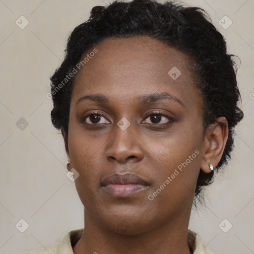 Neutral black young-adult female with short  brown hair and brown eyes