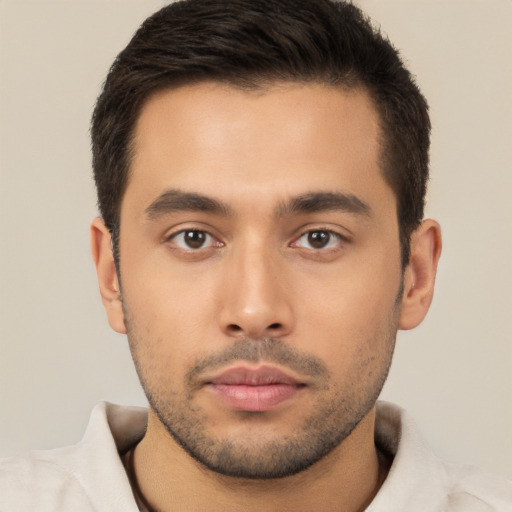 Neutral latino young-adult male with short  brown hair and brown eyes