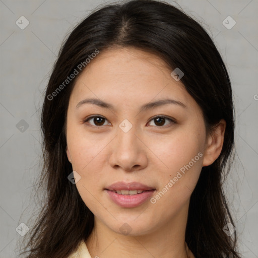 Joyful asian young-adult female with long  brown hair and brown eyes