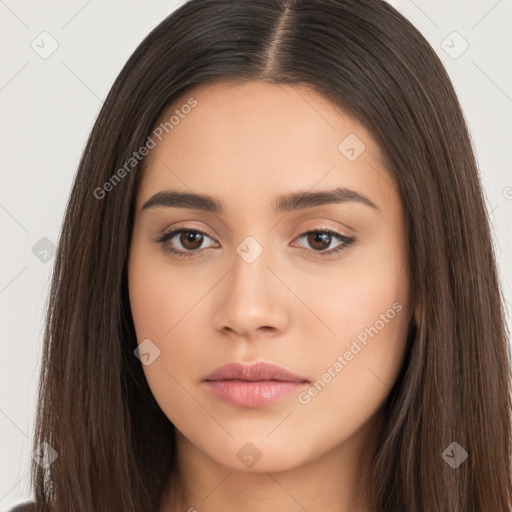 Neutral white young-adult female with long  brown hair and brown eyes