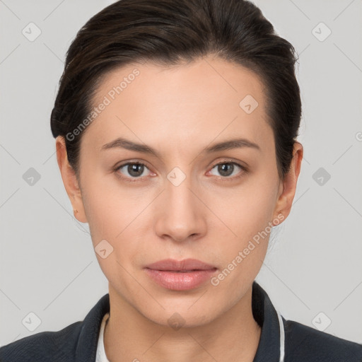 Neutral white young-adult female with short  brown hair and brown eyes